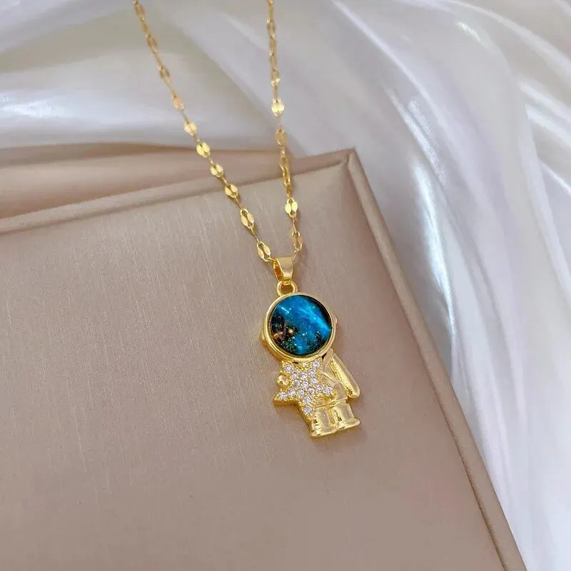 Shine Bright with Our Light Luxury Titanium Steel Star Series Necklace! πβ¨ Perfect Gold Planet Moon Astronaut Pendant for Every Woman! ππ