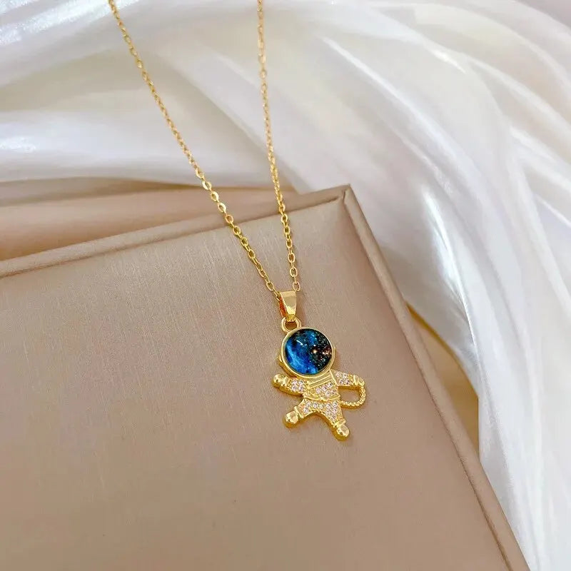 Shine Bright with Our Light Luxury Titanium Steel Star Series Necklace! πβ¨ Perfect Gold Planet Moon Astronaut Pendant for Every Woman! ππ