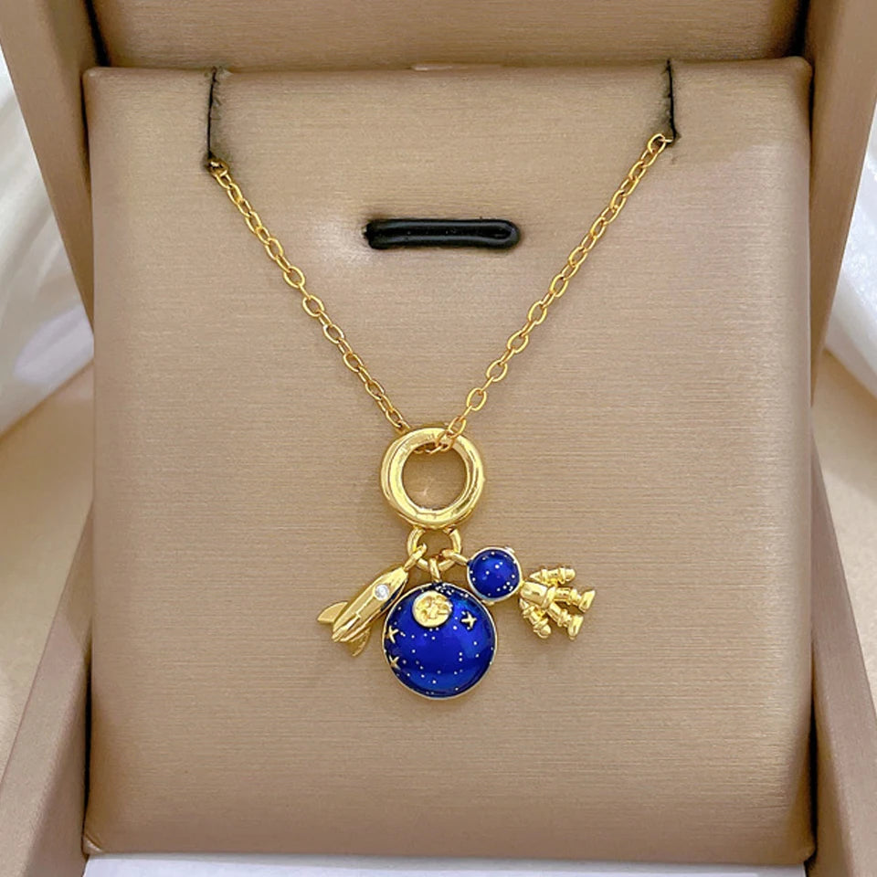 Shine Bright with Our Light Luxury Titanium Steel Star Series Necklace! πβ¨ Perfect Gold Planet Moon Astronaut Pendant for Every Woman! ππ
